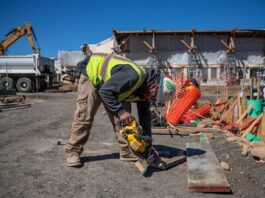 A California housing bill would raise wages to $28. Why do some unions hate it?